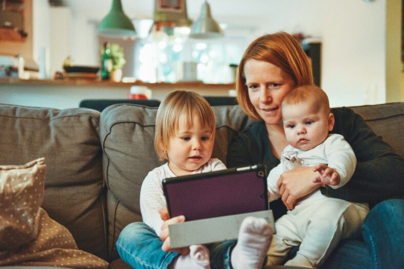 family sitting on a couch / wealth transfer