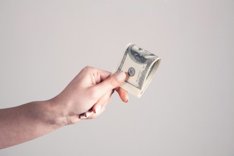 hand holding cash