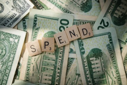 spend scrabble letters on money / small spending habits