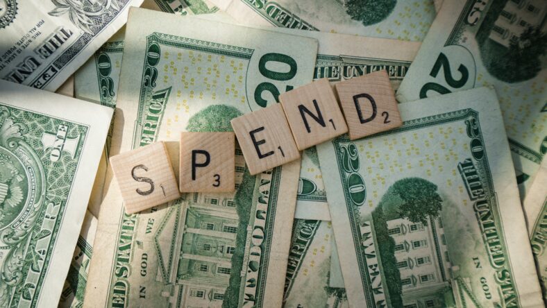spend scrabble letters on money / small spending habits
