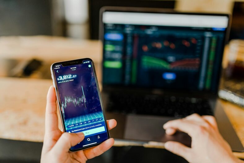 stocks on phone and computer